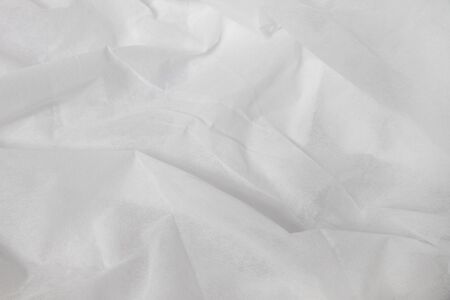 Beautiful folds of White Cloth texture.の写真素材