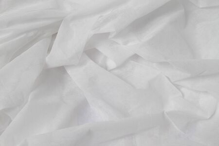 Beautiful folds of White Cloth texture.の写真素材