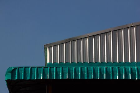 Corrugated roof metal sheets.