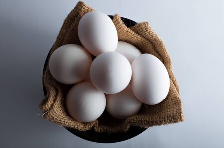 Easter eggs in a black bowlの写真素材