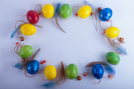 Easter frame from multi-colored eggsの写真素材