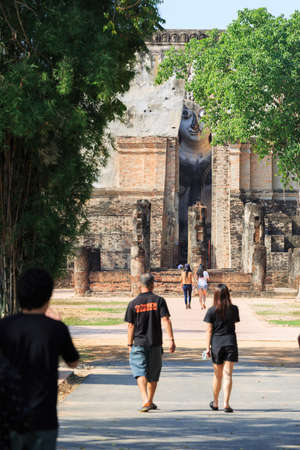 Sukhothai province, Thailand - December 23 2016:  Wat Sri Chum temple, the famous public national and historical park for traveler during nice weather of winter season.のeditorial素材