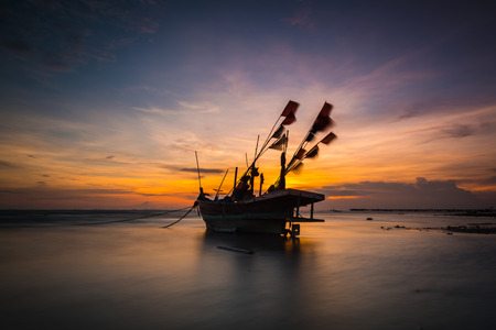 Fishing boat on the beach in thailandの写真素材