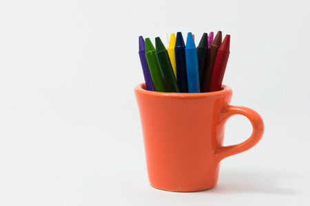 crayons full color with small cup for the child.の写真素材