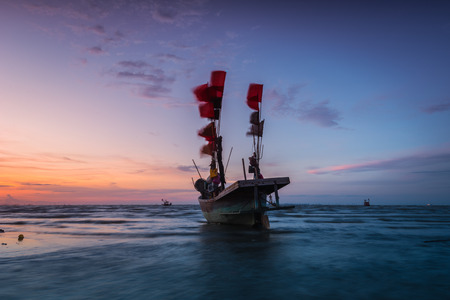 Fishing boat on the beach in thailandの写真素材