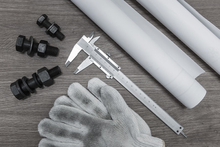 Bolts and nuts for high tension work with vernier caliper or equipment of engineer analyze for design or engineer inspector for checking and designの写真素材