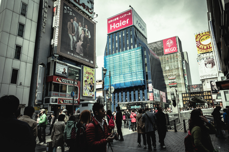 OSAKA, JAPAN - MAR 2015 : Street Food and Shopping zone in Japan. Cinematic filter.のeditorial素材