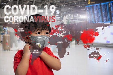 Asian little boy worrying about the Coronavirus disease (COVID-19) outbreak. Tourist protection and World Health concept. Outbreaks and emergency information, Global problem background.の写真素材