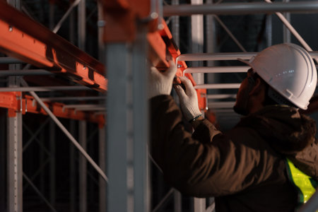 Maintenance technician service in cold warehouse storage, Machinery engineering people checking...