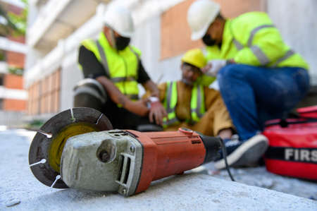 Hand of builder worker injury bleeding, accident in work, Using construction power tools unsafe and...