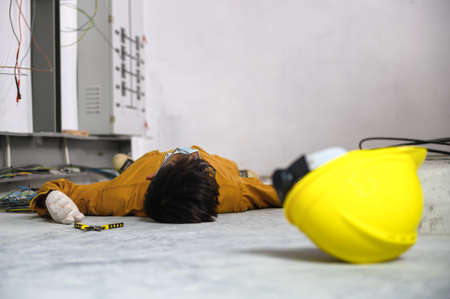 Accident in work of electrician people or Maintenance worker in the control room of factory.の写真素材