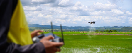 Agriculture Technology Drone Fly to Spray Fertilizer on Rice Fields, Modern Farming Techniques and...