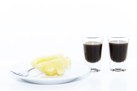 Healthy snack set with coffee and pineapple on white backgroundの写真素材