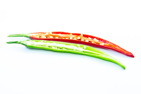 Section of green and red chili pepper on white backgroundの写真素材