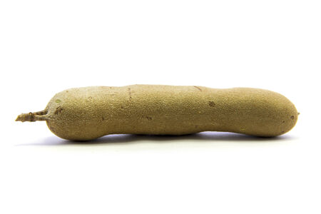 Side fresh ripe tamarind texture on white backgroundの写真素材
