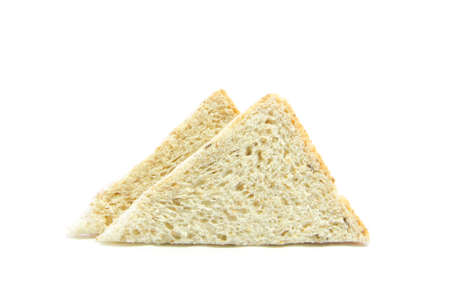 Whole wheat and oat bread sandwich raw on white backgroundの写真素材