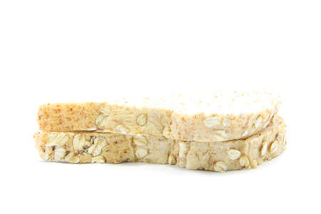 Whole wheat  bread edge with oat texture on white background