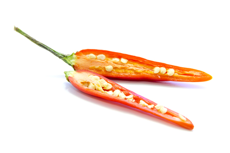 Half sliced of red chili pepper on white backgroundの写真素材