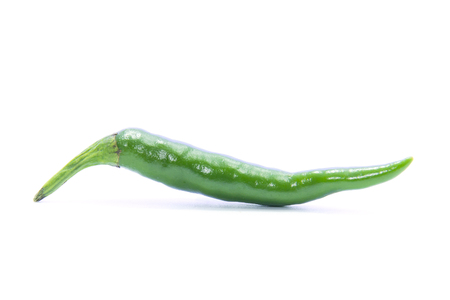 Fresh green chili cayenne strange form on white backgroundの写真素材