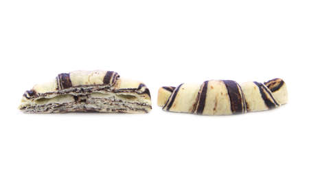 Croissant cross sliced with chocolate mix on white backgroundの写真素材