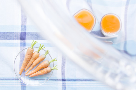 Blurring Carot juice and raw material on table matの写真素材