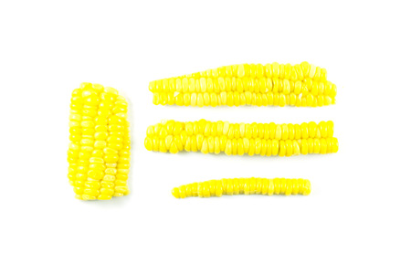 Sweet yellow corn different arrange on white backgroundの写真素材