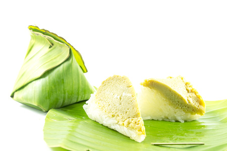 Sticky rice custard in green packaging on white backgroundの写真素材