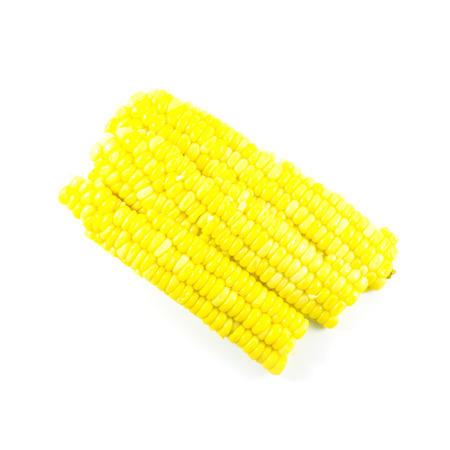 Sweet yellow corn slice ingredient on white backgroundの写真素材