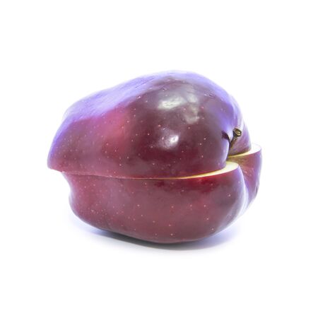 Sliced red apple cross section on white backgroundの写真素材