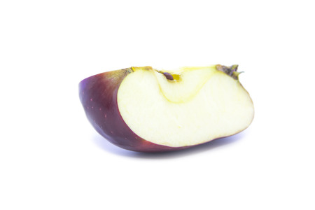 Fresh sliced red apple ingredient on white backgroundの写真素材
