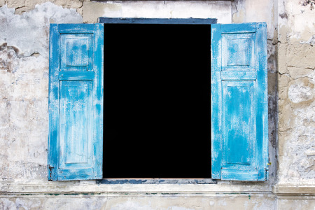 Open window detail in old architecture with peel of colorの写真素材