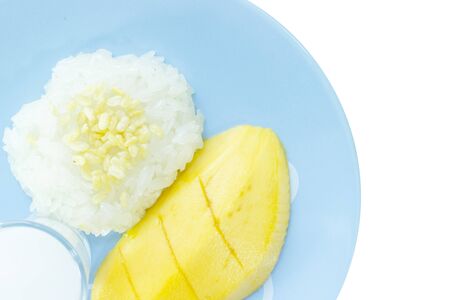 Mango sticky rice dessert on top view and white backgroundの写真素材