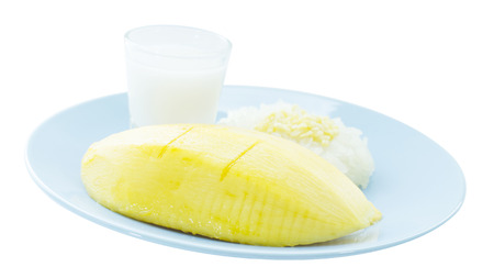 Mango sticky rice and coconut creamy dessert on white backgroundの写真素材