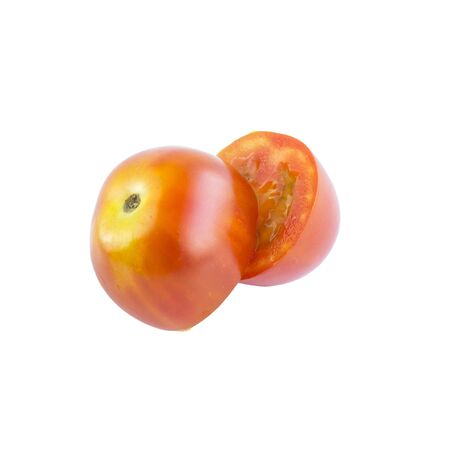 Cross Section sliced red tomatoes on white backgroundの写真素材