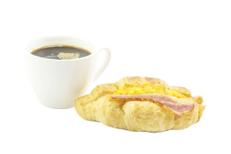 Croissant egg and bacon with black coffee breakfast on white backgroundの写真素材