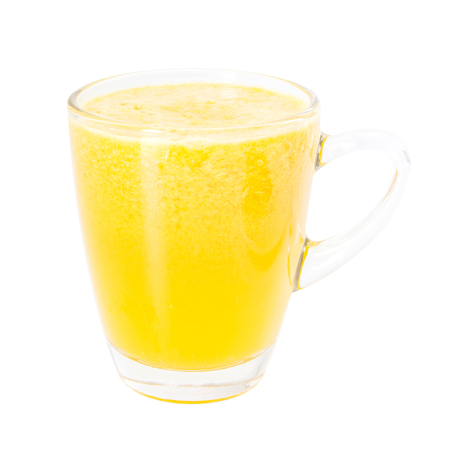 Fresh orange juice smoothie dirnk in glass on white backgroundの写真素材