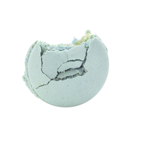 Bite blue macaron with mint flavour on white backgroundの写真素材