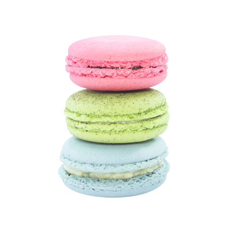 Colorful macaron triple layer with pink green blue on white backgroundの写真素材