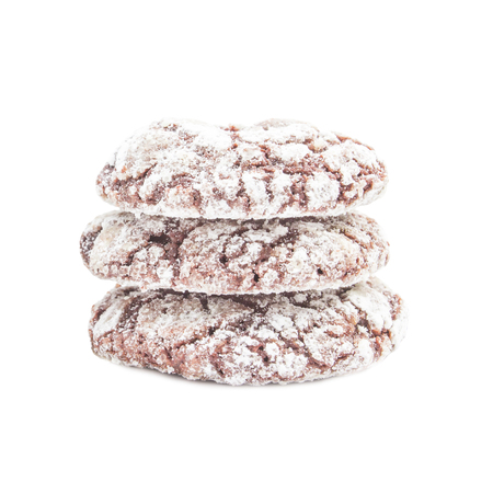 Chocolate cookies homemade with icing powder on white backgroundの写真素材