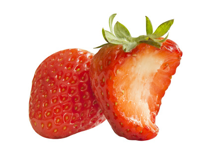 Fresh red strawberry bite a half section on white backgroundの写真素材