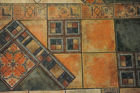 The texture of the tiles on the floor in a mosaic style