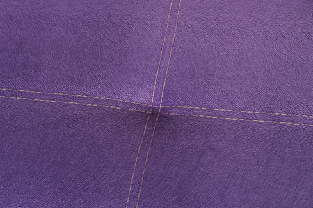 Texture of violet furniture fabric, with seamsの写真素材