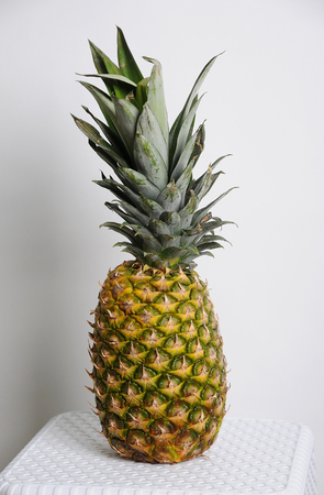 Pineapple on light white background
