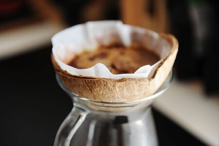 Unusual creative craft coconut shell pourover drip alternative coffee brewingの写真素材
