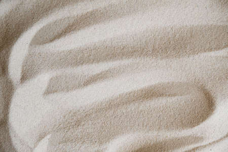Wavy fine sand texture. Natural background