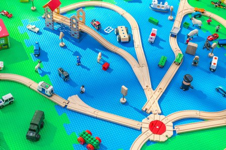Playground of artificial color materials with cars and railwayの写真素材