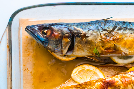 cooked fish mackerel with lemonの写真素材