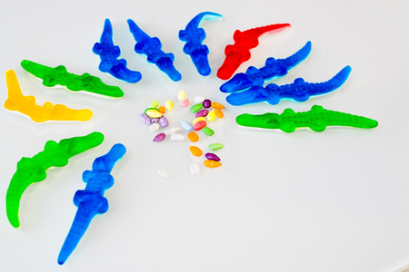 candy from the marmalade in crocodiles of different colorsの写真素材