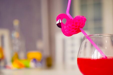 drink red with decorative drinking tube decorated with Flamingo figureの写真素材