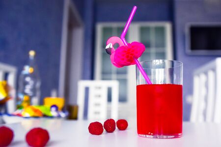 drink red with decorative drinking tube decorated with Flamingo figureの写真素材